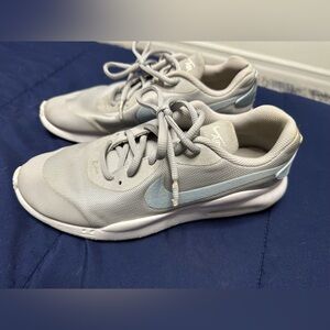 Gray and blue Nike sneakers